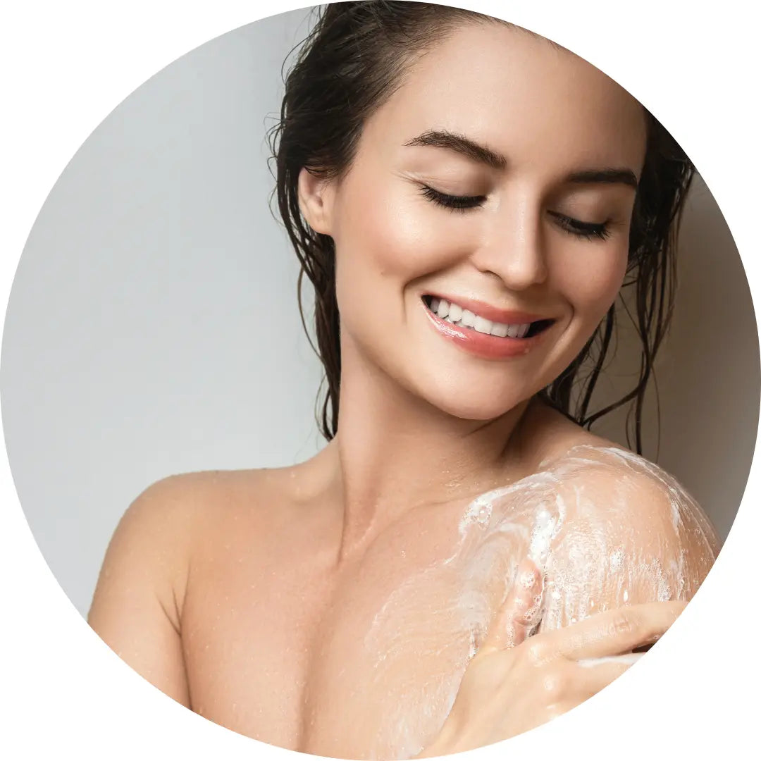 woman using a Buddha Beauty Vegan hair and body wash, vegan shower gel,