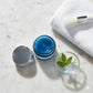 alchemy skincare blue tansy mask on table top, open jar 