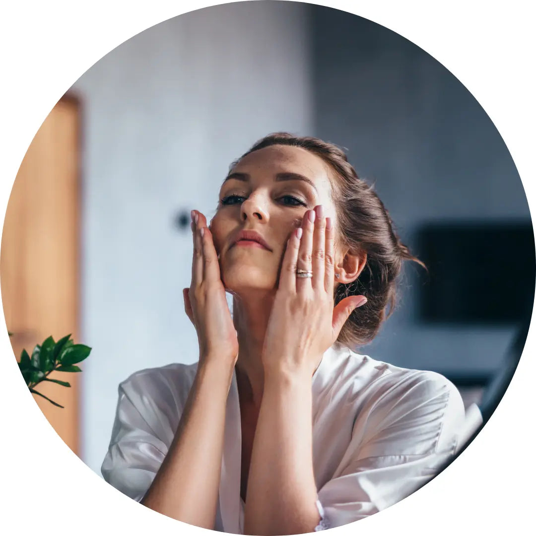 facial cleansing balm, woman cleaning her fae 